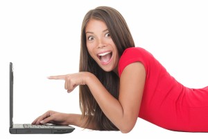 bigstock-Woman-Excited-With-Laptop-8175184